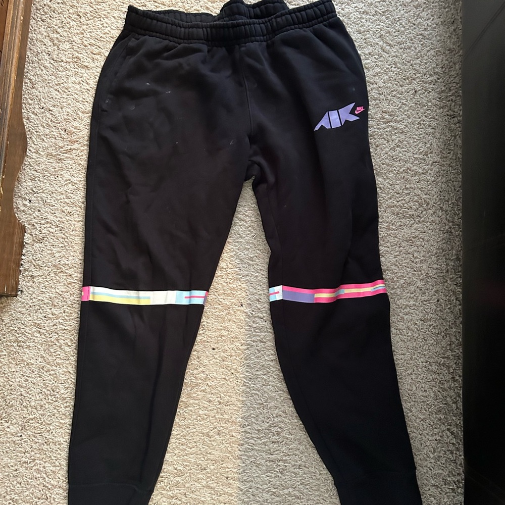 Nike Black and Pink Joggers with Tapered Fit